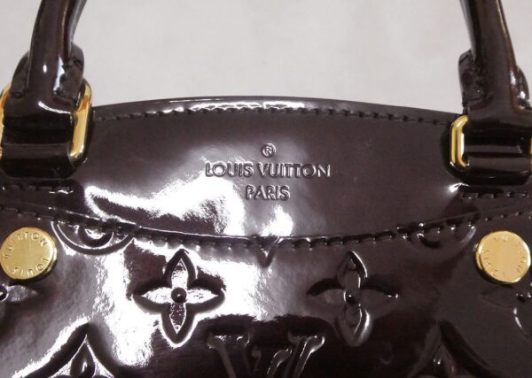 Manhattan cloth handbag Louis Vuitton Brown in Cloth - 36462331